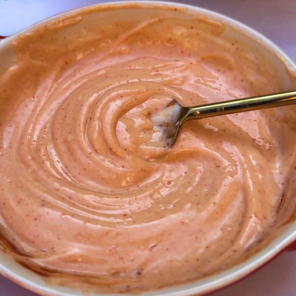 Spicy mayo sauce in a small bowl, ready to add zing to your dish.