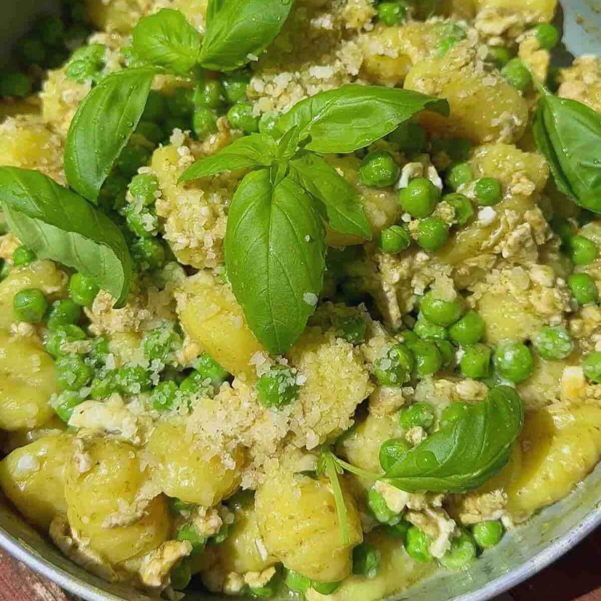 A pan of Pesto Gnocchi with Peas and Basil.