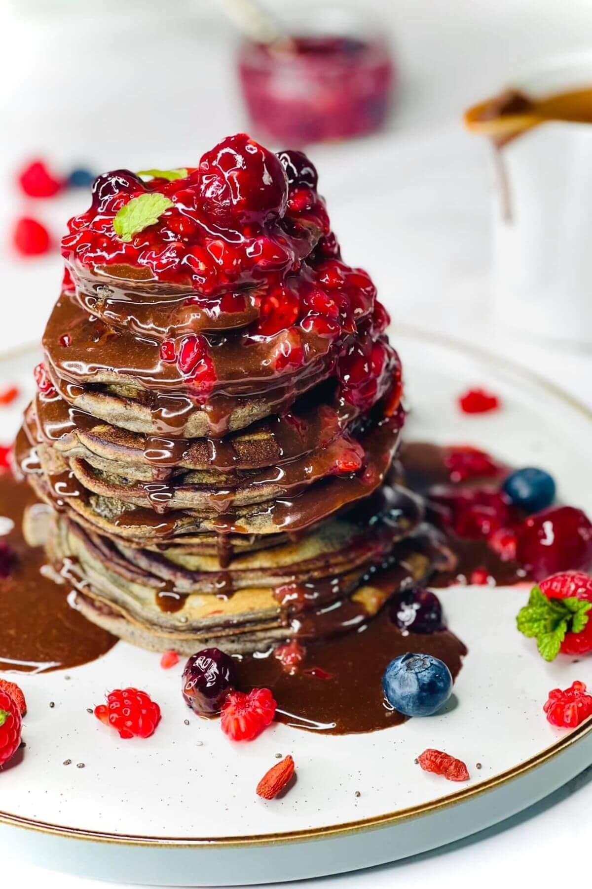 A stack of American Style Chocolate Berry Pancakes. 