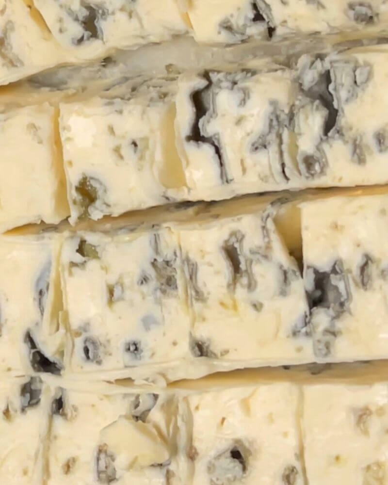 Chunks of Gorgonzola cheese cut into cubes