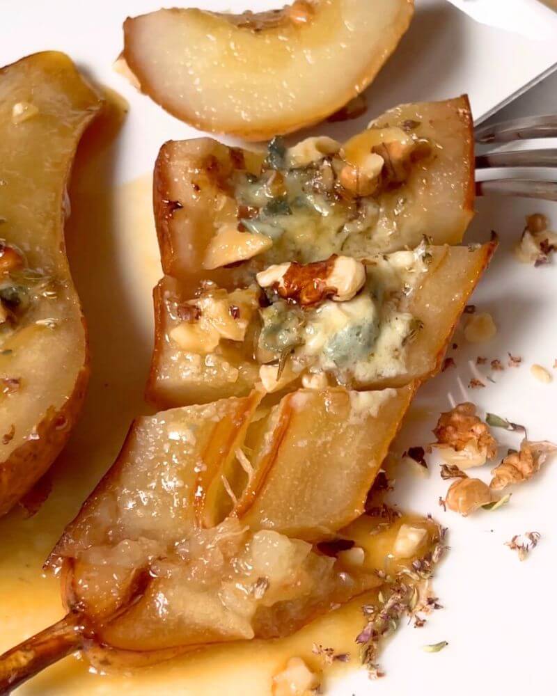 Baked Gorgonzola Pears drizzled with honey and cut into bites. 