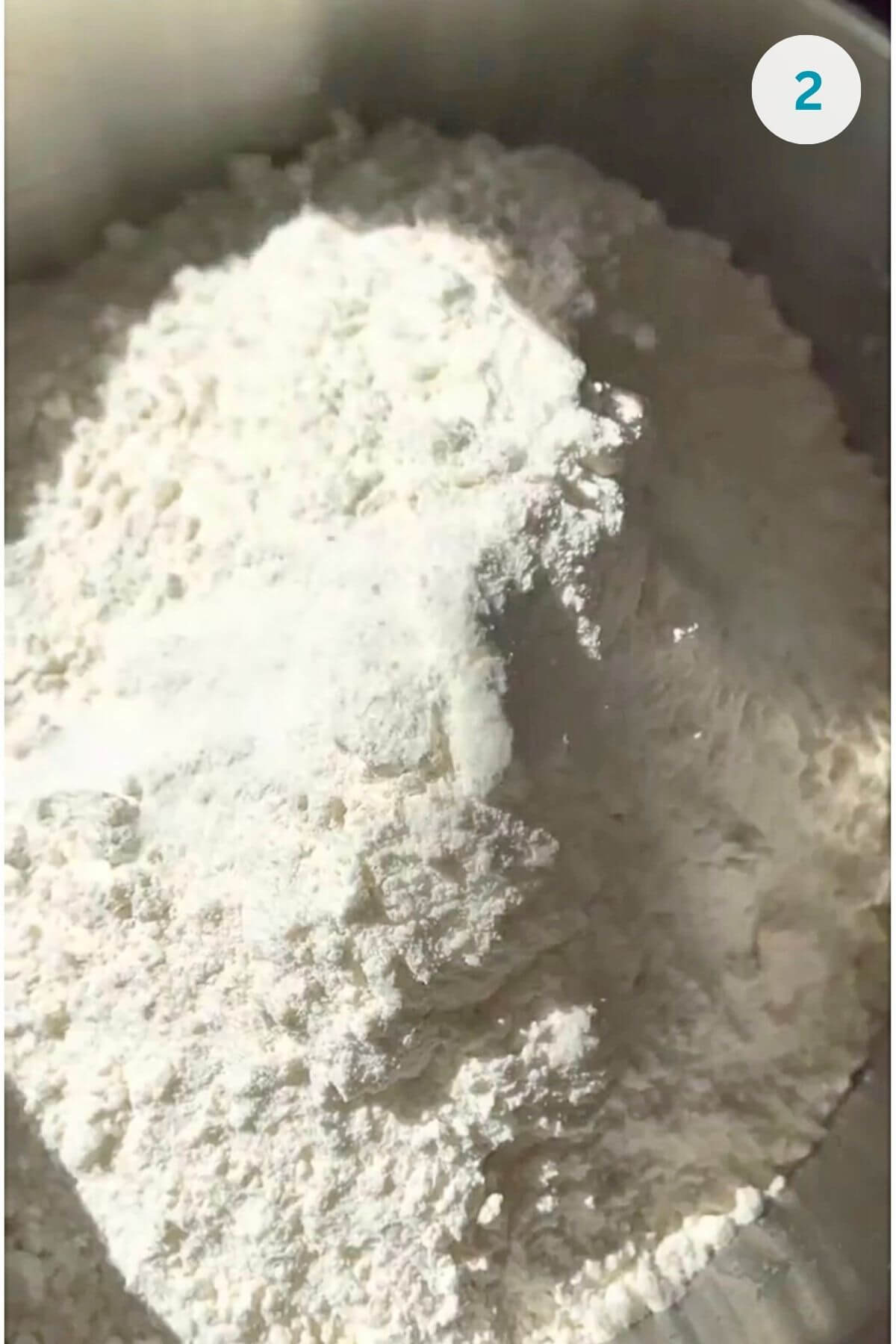 Added flour and salt and kneaded until a soft, slightly sticky dough formed.