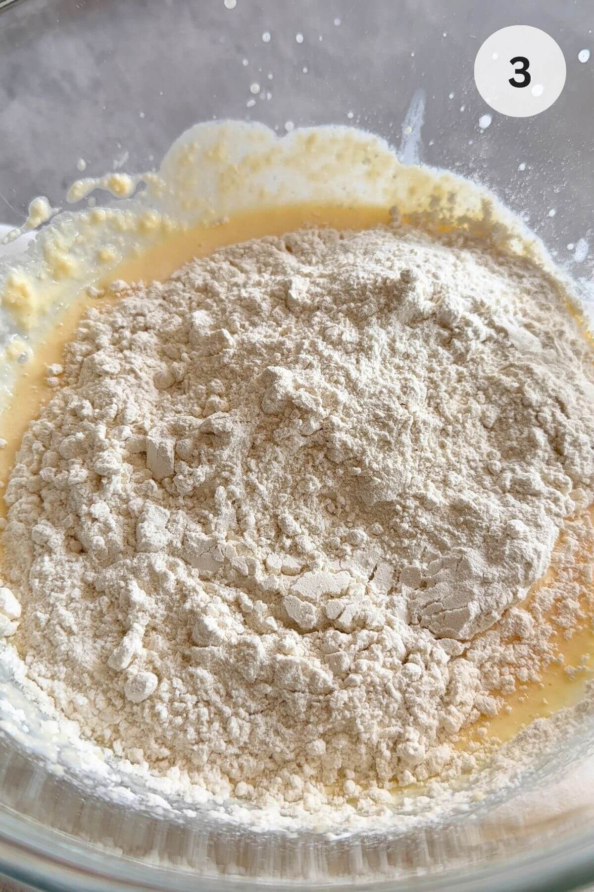 Sprinkle in the flour and fold gently with a spatula—avoid overmixing.