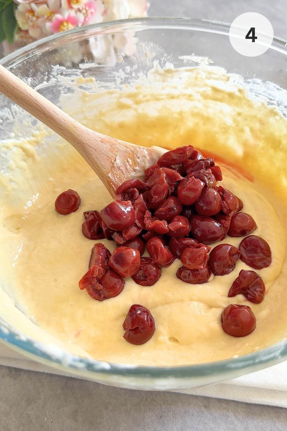 Once the batter is combined and dry spots are gone, gently fold in the cherries.