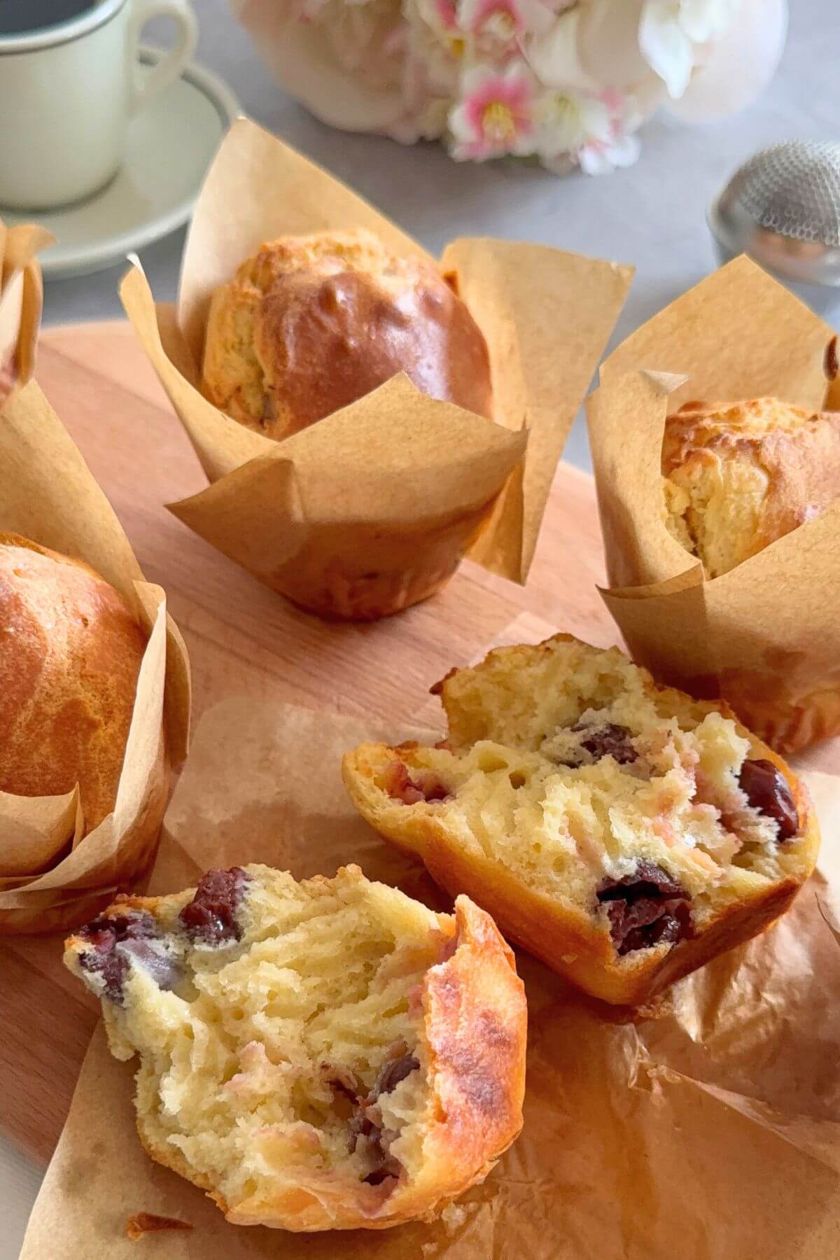  6-Ingredient Air Fryer Muffins (No Mixer, No Butter!) with one muffin split in half to show the inside.