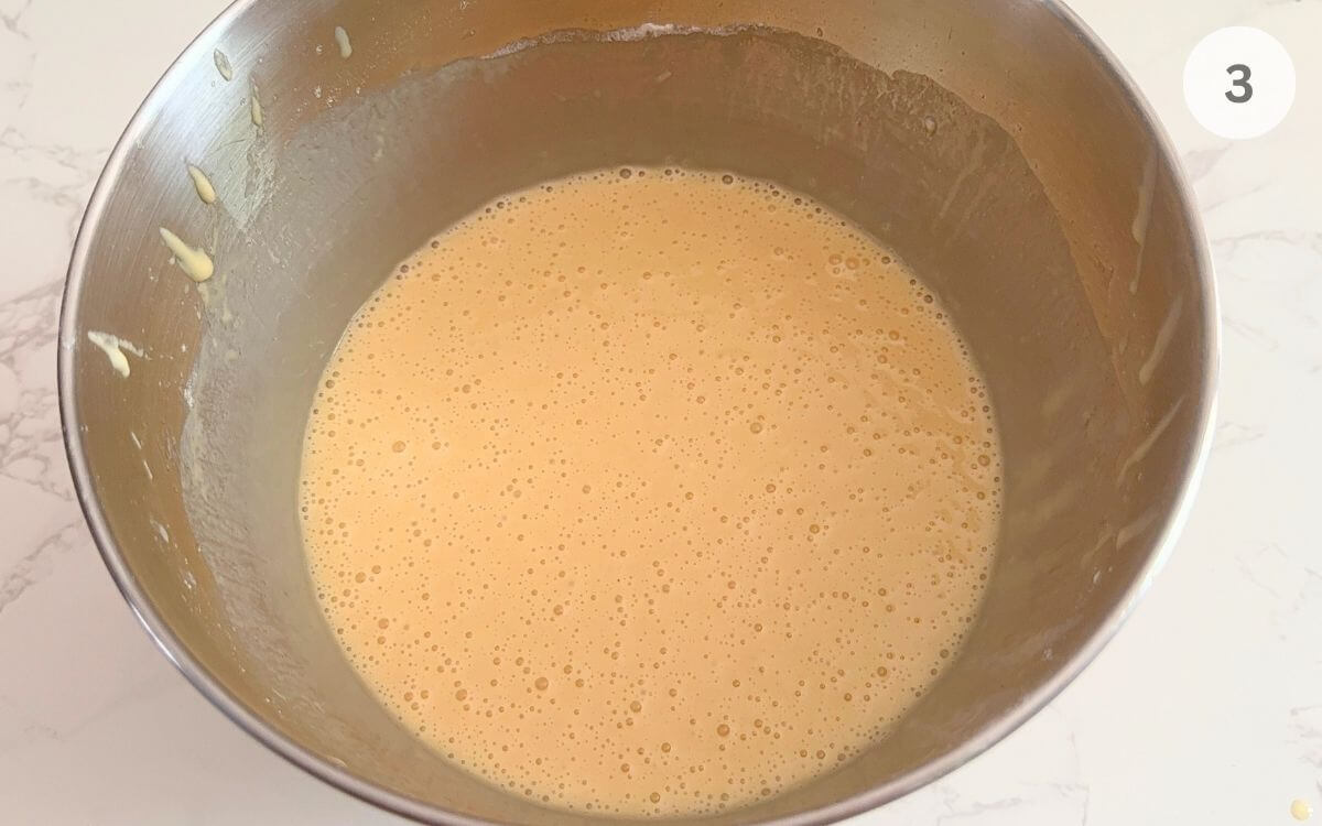 Warmed butter, milk, oil, and vanilla mixed into the batter until smooth.