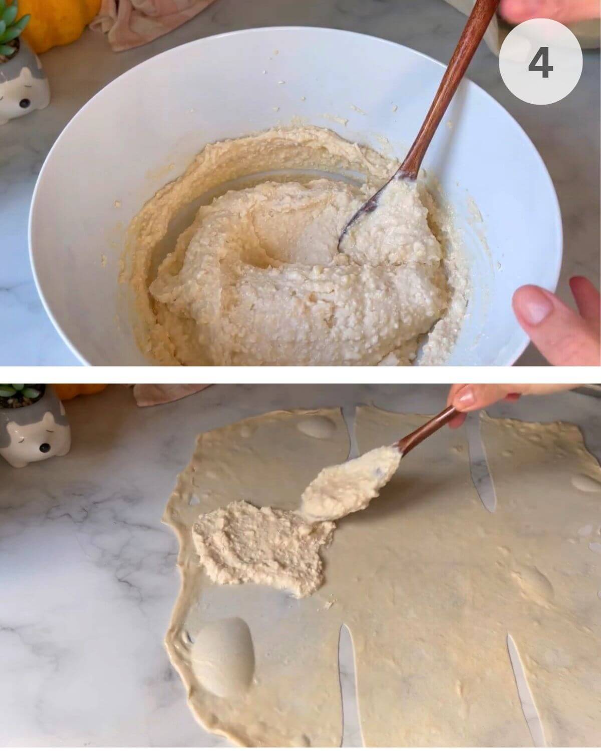 Thinly stretched dough on an oiled surface with cheese filling added and sections folded.
