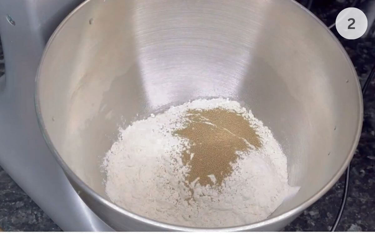 Yeast sprinkled over the flour.