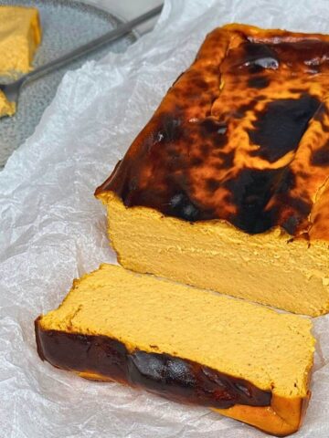 Burnt basque cheesecake slice with creamy pumpkin filling.