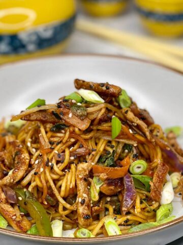 Savory pork and cabbage with noodles, all cooked conveniently in a single pot.