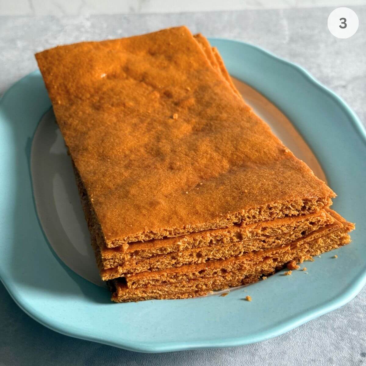 Six layers of Russian honey cake ready for assembly.