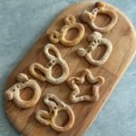 Mini bear shaped baked churros, healthier, dusted with cinnamon sugar, served with chocolate ganache.