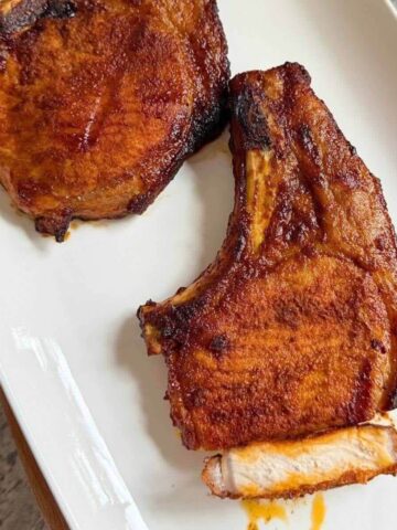 uicy thick pork chops in air fryer with brown sugar spice rub, bone-in.
