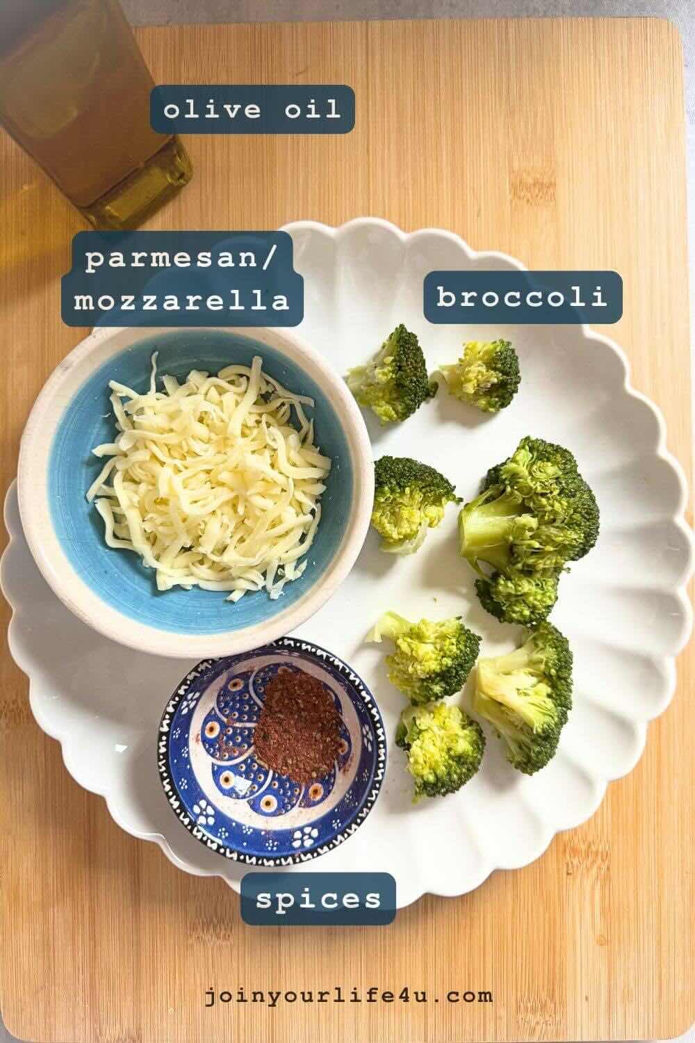 Broccoli, olive oil, garlic powder, oregano, paprika, cumin, parmesan cheese, individually displayed on a table.