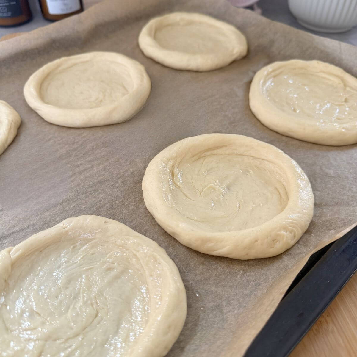 Dough shaped ready to be filled with custard and fruits.