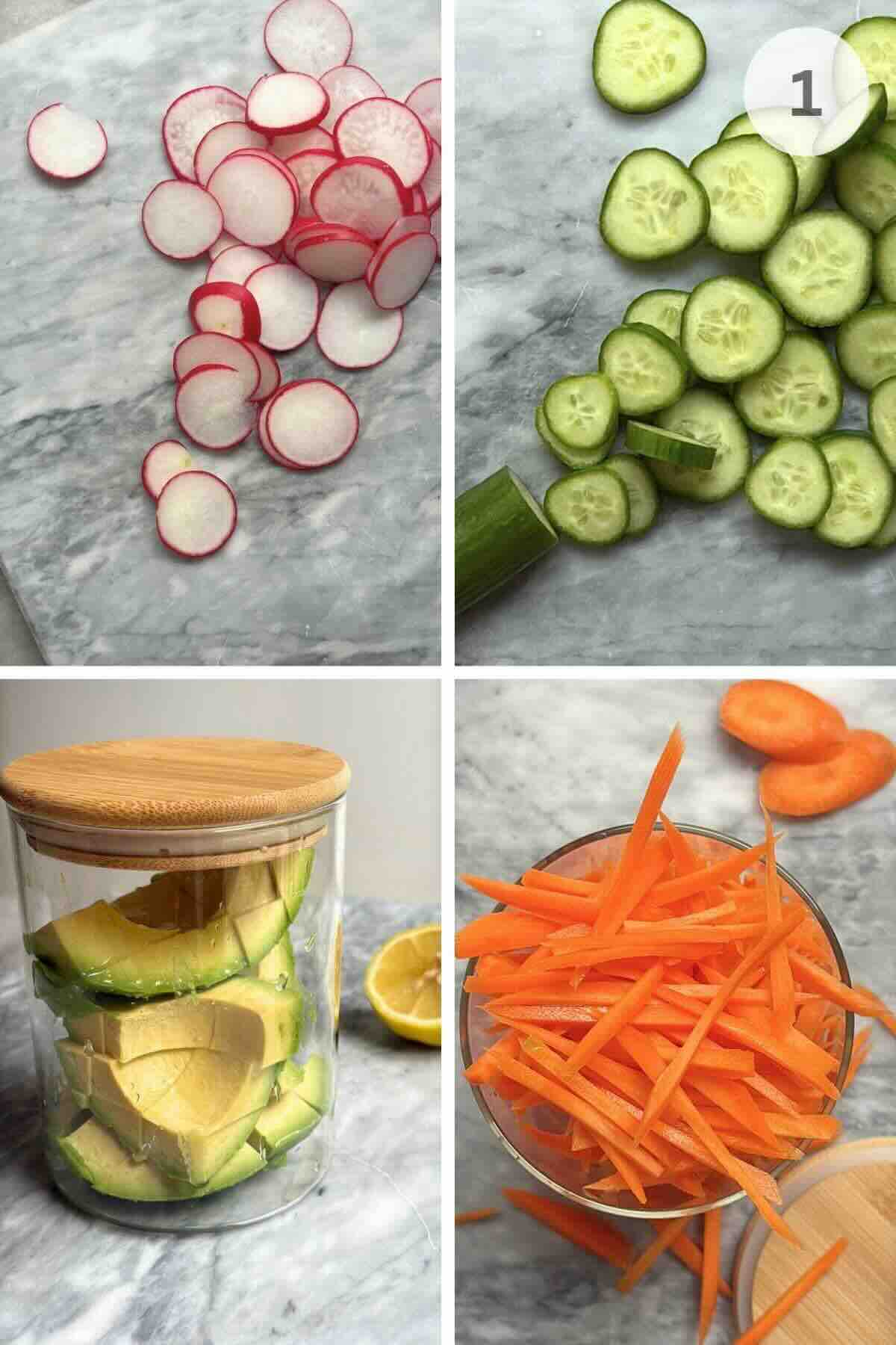 Freshly chopped avocado, cucumber, carrots, and mango arranged on a cutting board.