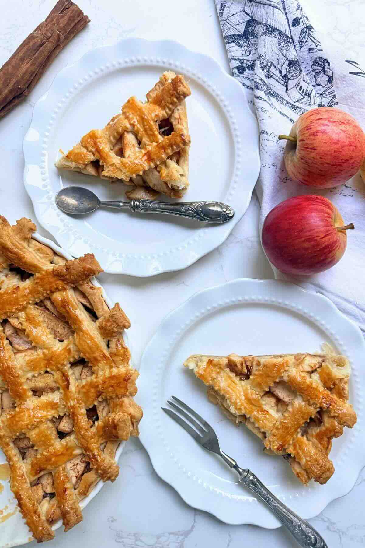 Puff pastry apple pie with golden lattice top, fresh from the oven.