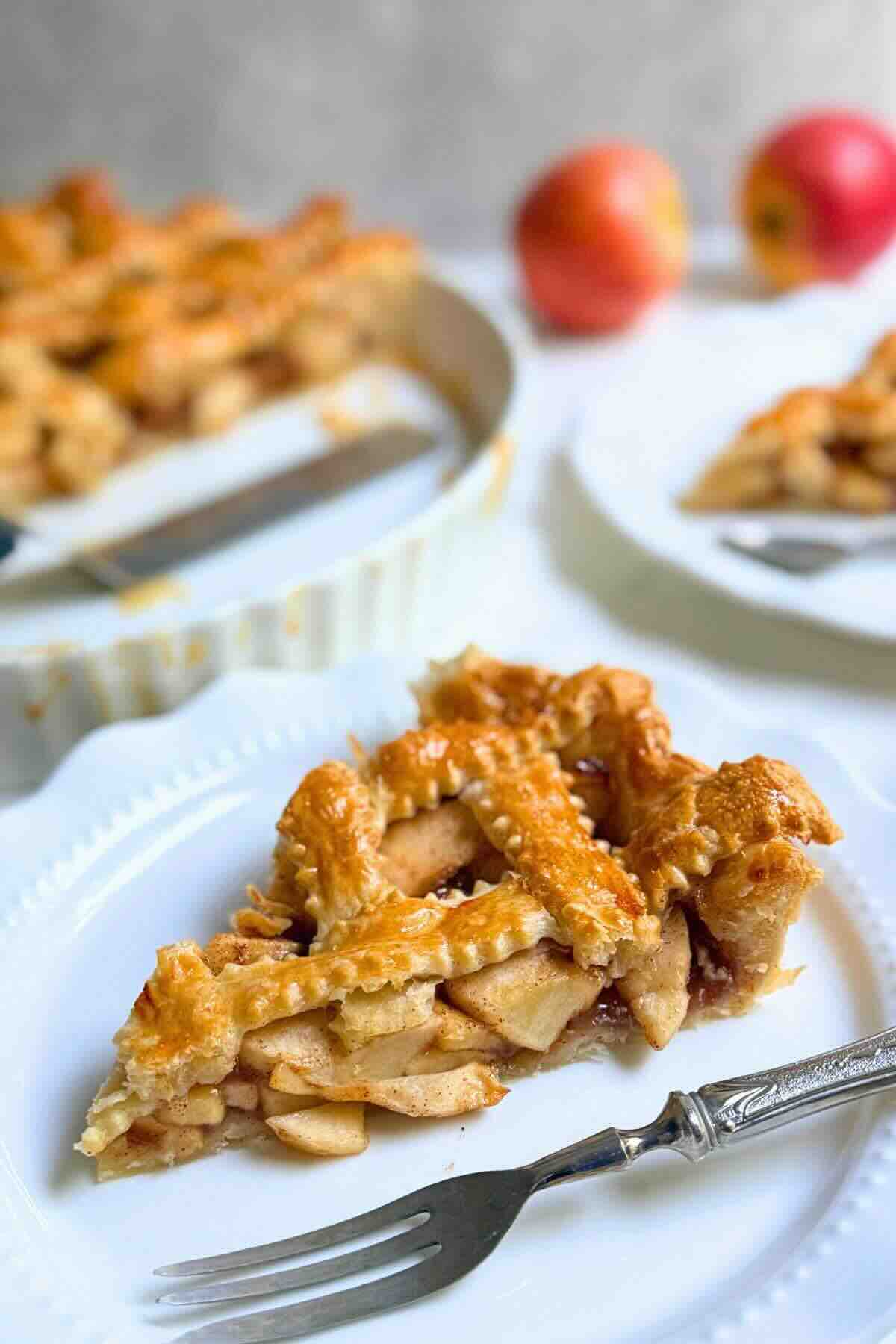 Puff pastry apple pie with golden lattice top, fresh from the oven.